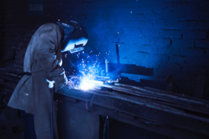 a welder working with a torch